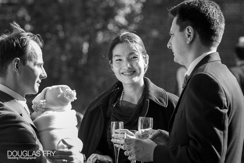 guest photographed at Cambridge Cottage Kew by wedding photographer