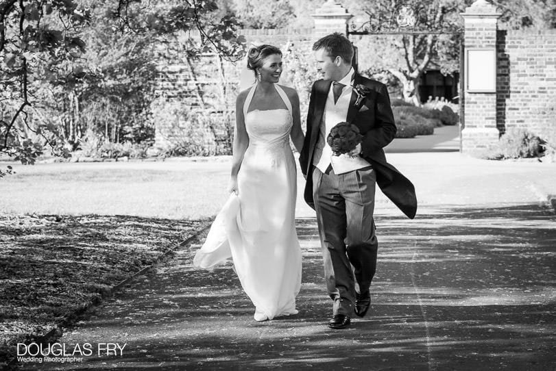 bride and groom photographed at Cambridge Cottage Kew by wedding photographer