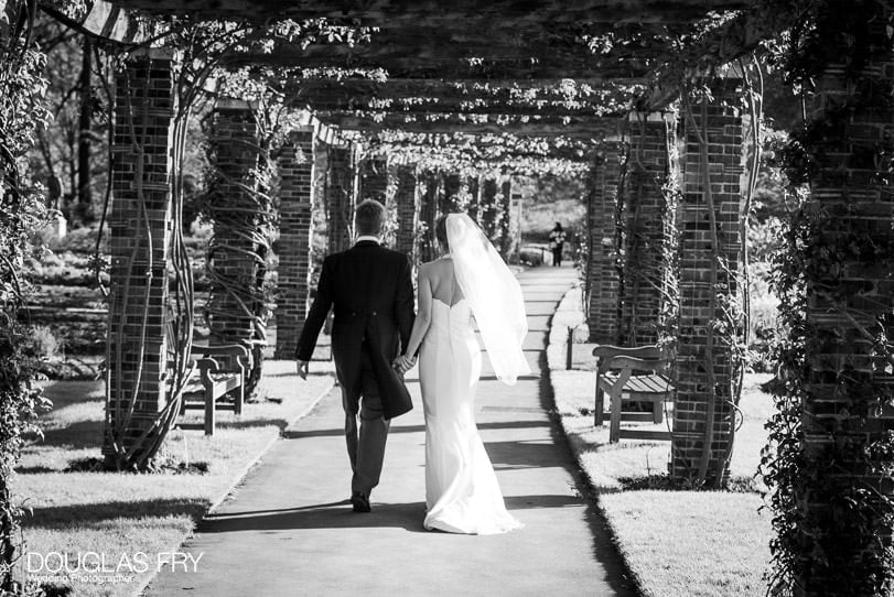 bride and groom photographed at Cambridge Cottage Kew by wedding photographer