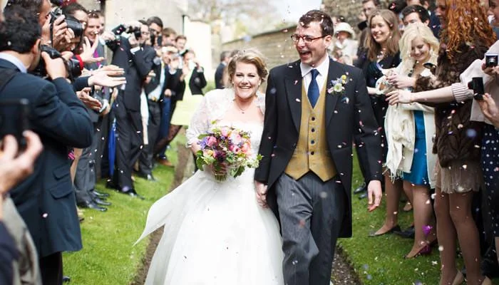 Douglas Fry Wedding Photography Lincolnshire Photograph of Bride and Groom Leaving Church