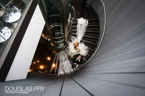 Wedding Photography at St Botolph's Church & Gherkin in London 3 Bride and groom photographed on stair case at Gherkin