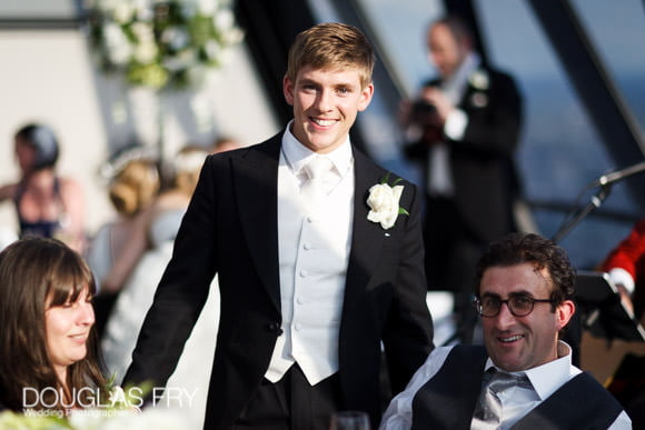 Brother of the bride during wedding reception at the Gherkin