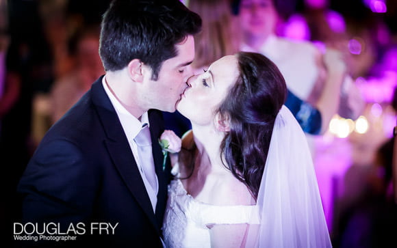 Wedding Photograph taken of kiss at Bluebird Chelsea