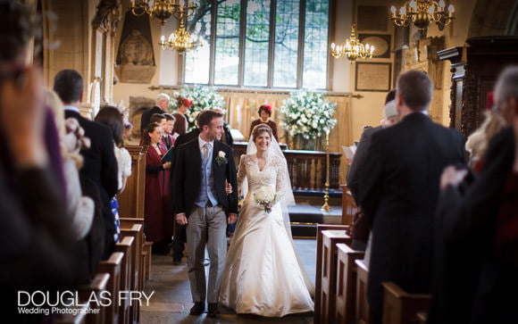 couple in aisle at Chelsea Old Church