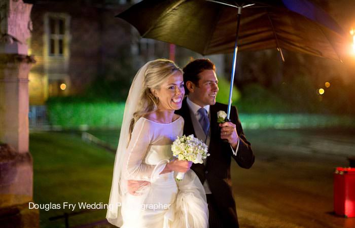 Wedding Photograph in Rain at Hampton Court Palace