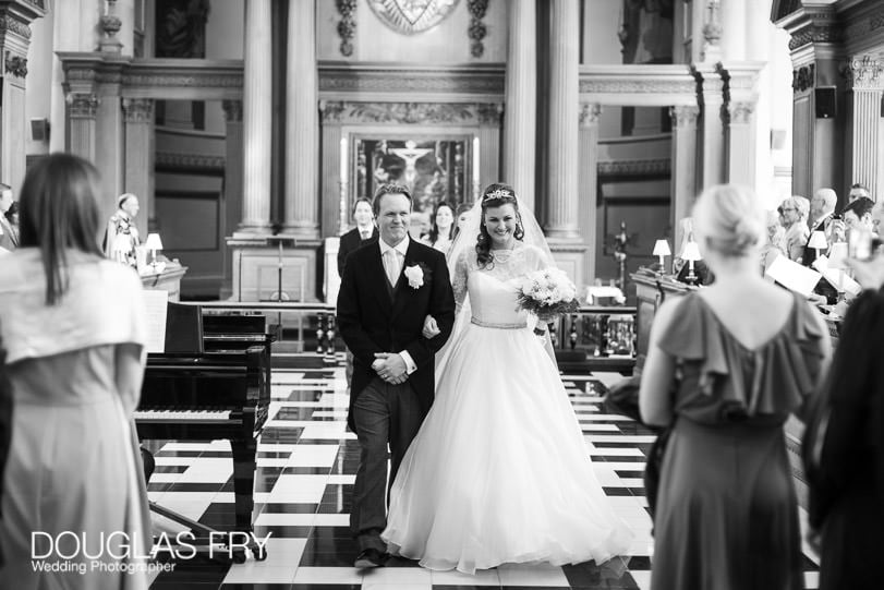 Wedding Photographer St Brides Church London - leaving the church