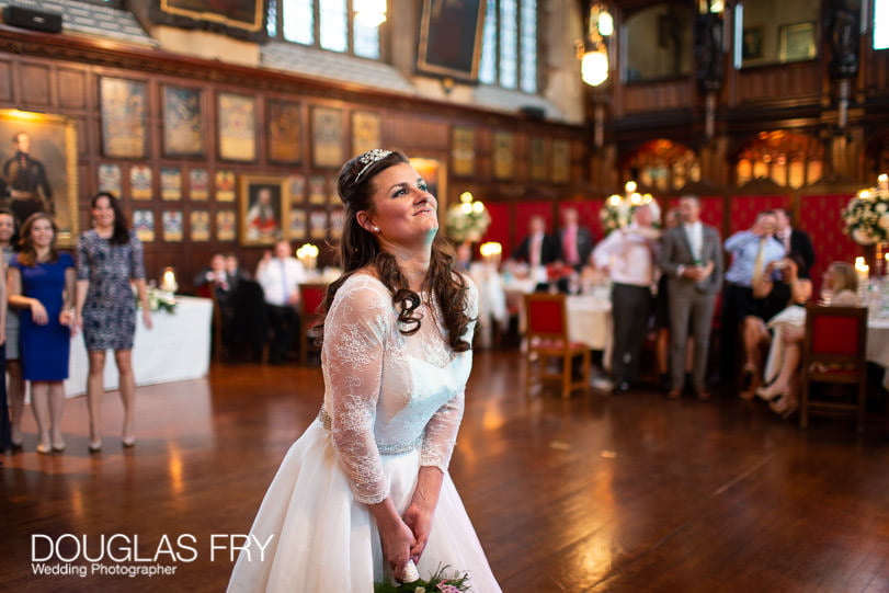 Wedding Photographer Lincolns Inn London - throwing the bouquet