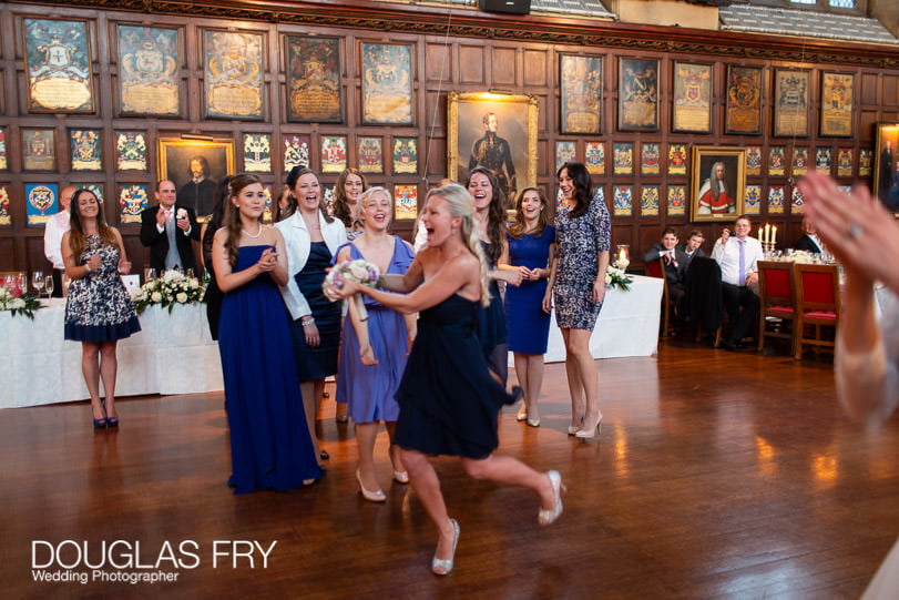 Wedding Photographer Lincolns Inn London - throwing the bouquet