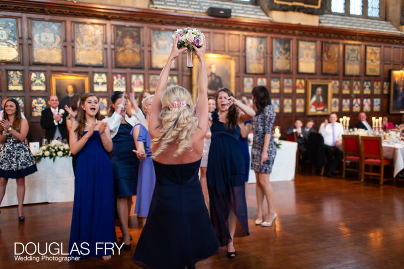 Wedding Photographer Lincolns Inn London - throwing the bouquet