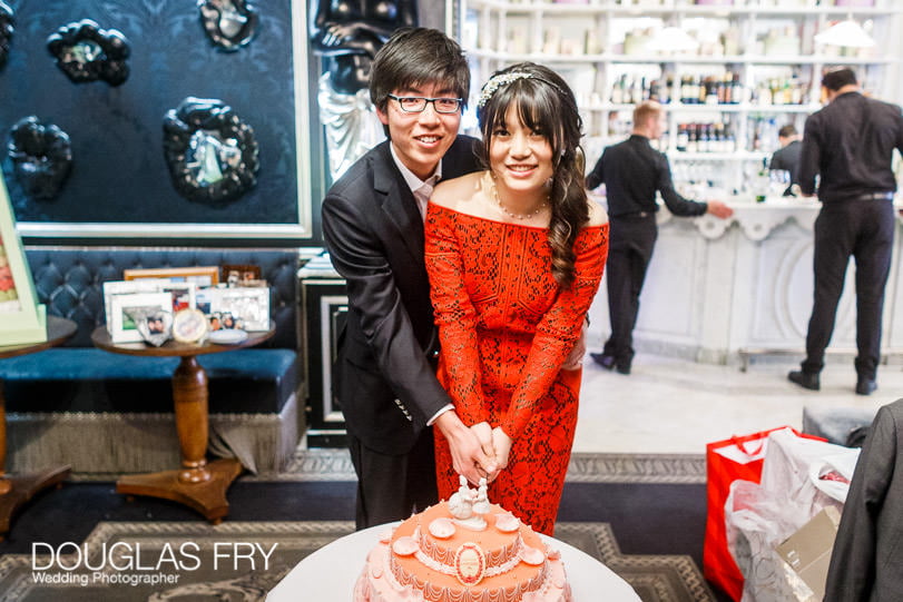 Cake cutting at Harrods wedding