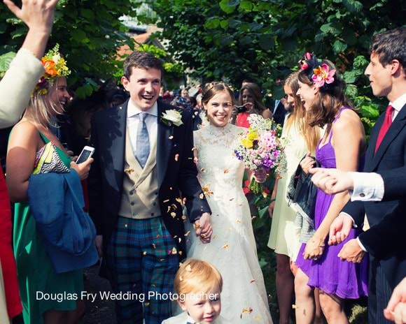 Wedding Photography Hampshire with confetti outside church