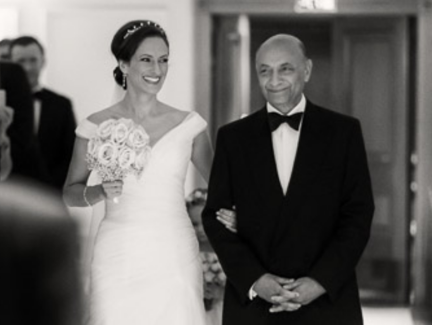 Wedding photograph of bride entering ceremony at Savoy Hotel
