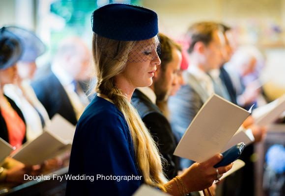 Leica Wedding Photographer London - photograph of guest in church