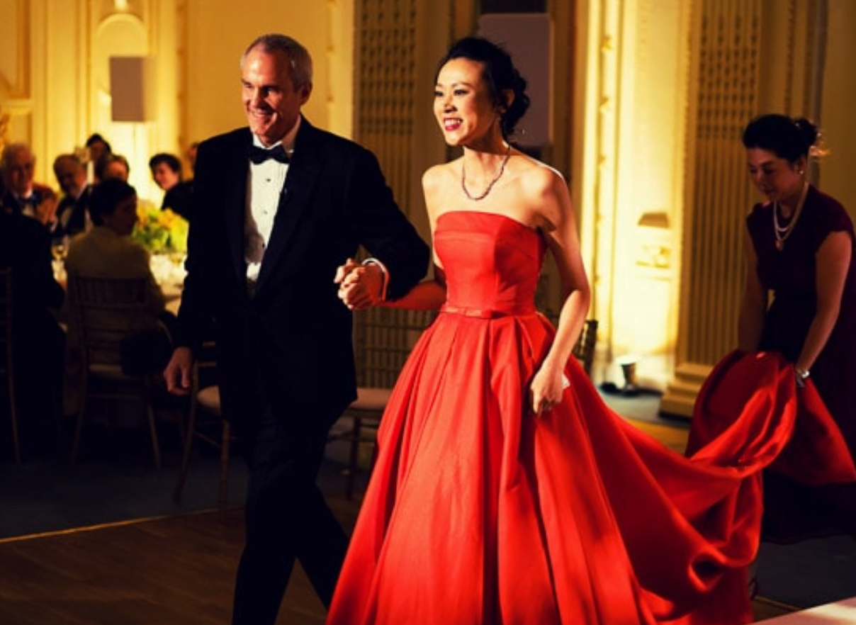 Bride and groom going into dinner
