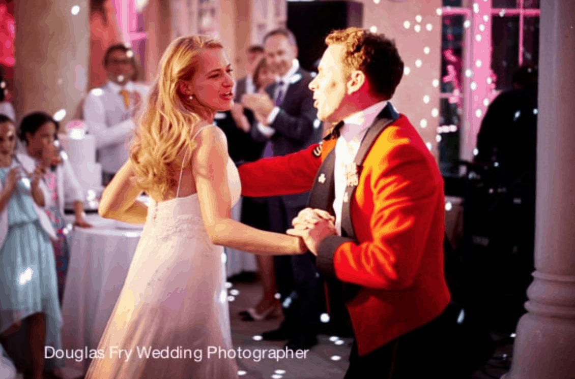 Bride and groom dancing during wedding reception