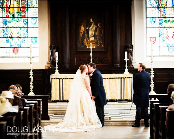 Bride and groom in church at St Lawrence Jewry - London