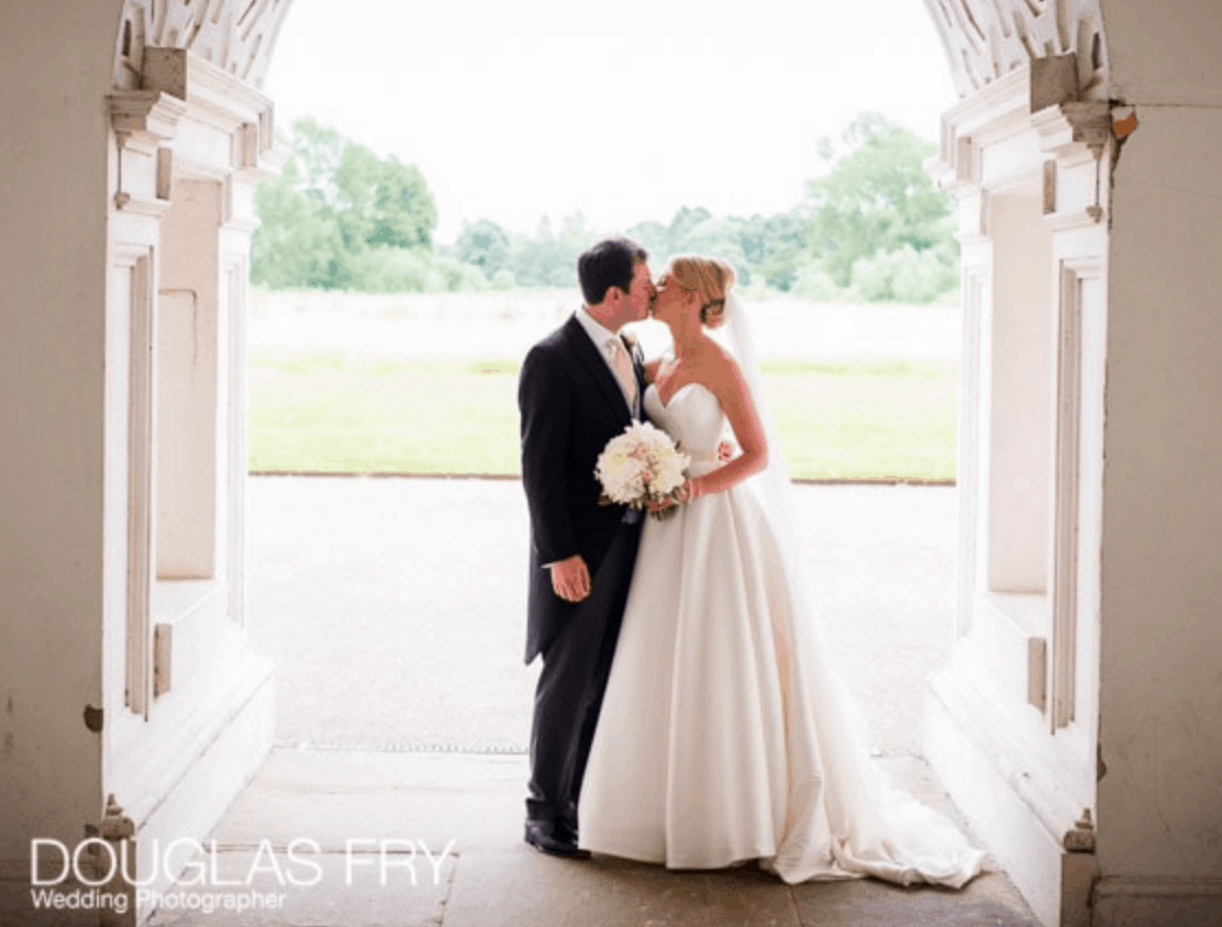 Syon House - Couple kissing beneath arch