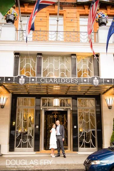 Wedding Dinner at The Mandarin Oriental - Getting Ready Photography at Claridges Hotel 4 Front door of Claridge's Hotel with couple pictured