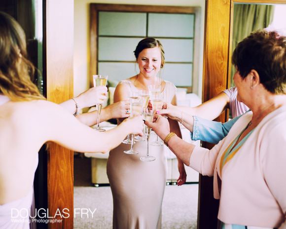 The Devonshire Terrace - Bride Getting Ready with Champagne