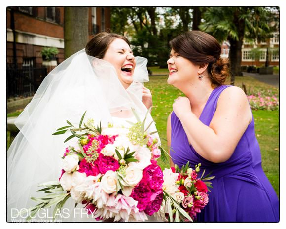 bride and bridesmaid outside London Church after wedding