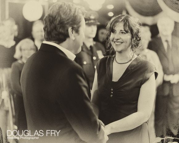 Bride and groom exchanging vows during wedding ceremony