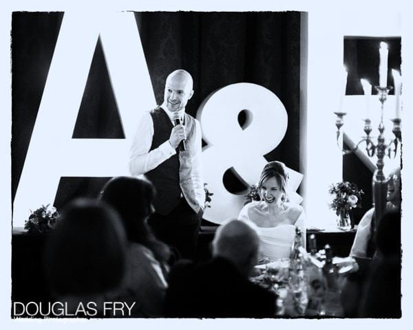 Groom making speech during wedding breakfast