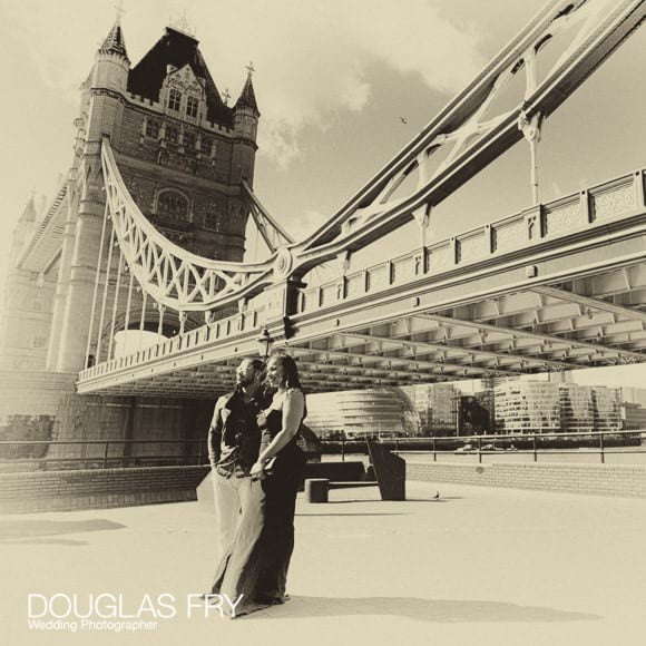 Photography of couple in front of Tower Bridge in London