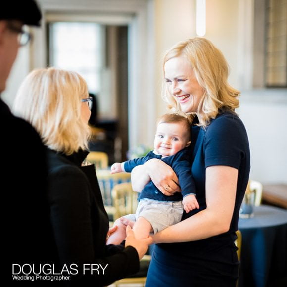 Photograph of Ene with Harry during naming Ceremony