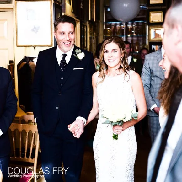 Laura and Andy's Wedding Photographed at Soho Hotel and the Union Club 4 Bride and groom during wedding ceremony at Union Club