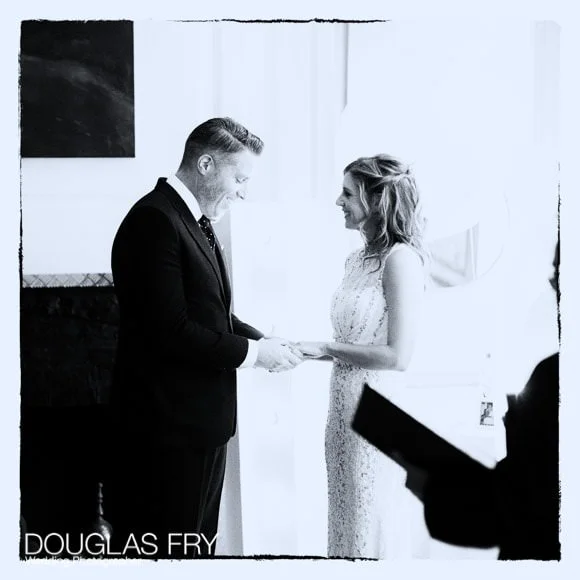 Laura and Andy's Wedding Photographed at Soho Hotel and the Union Club 5 Exchanging vows during ceremony at Union Club