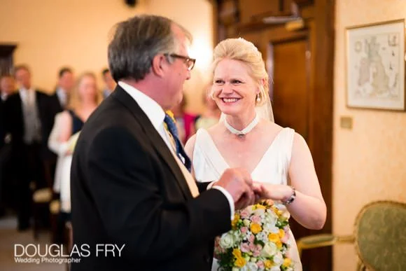 Wedding Photographer The Cavalry and Guards Club - Tara & Tim 1 Exchanging vows at Chelsea Register office