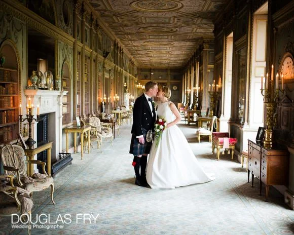 Wedding Photographer Richmond Golf Club and Syon 6 Kiss at Syon in Long gallery