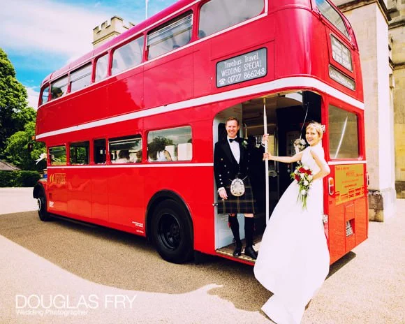 Wedding Photographer Richmond Golf Club and Syon 7 Couple photographed on London bus in front of Syon House