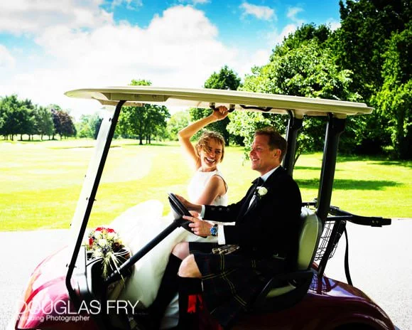 Wedding Photographer Richmond Golf Club and Syon 1 Couple in golf buggy at Richmond Golf Club