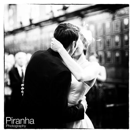 Middle Temple Wedding 3 Black and white photograph of couple kissing during ceremony at Middle Temple