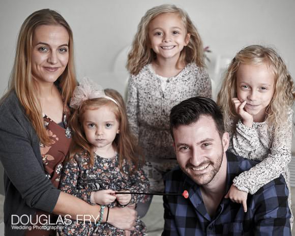 Children and parents photographed together during family photo shoot
