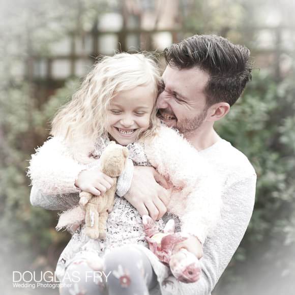 Father and daughter photographed together during photo shoot