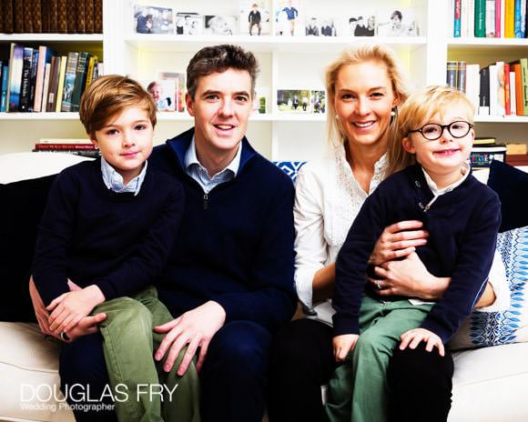 Family photographed together at home for Christmas card