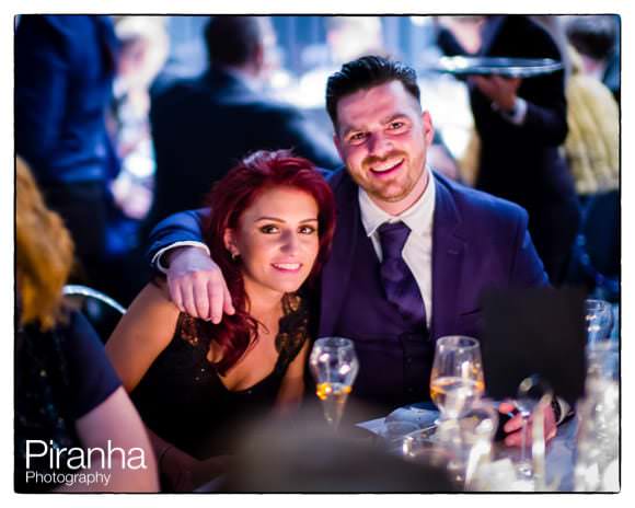 Guests photographed during wedding reception