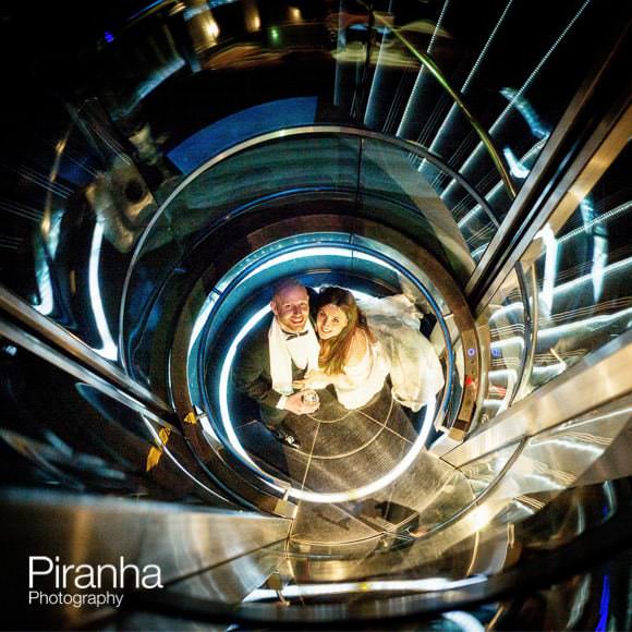 Bride and groom photographed on Gherkin staircase