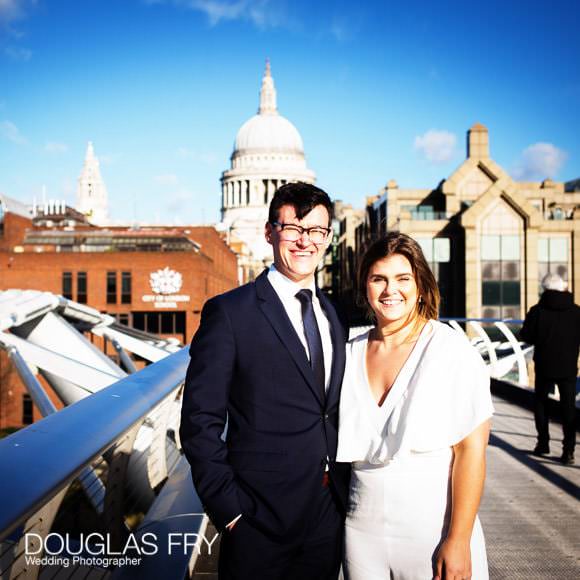 Wedding photograph on Millennium Bridge in London with St Pauls