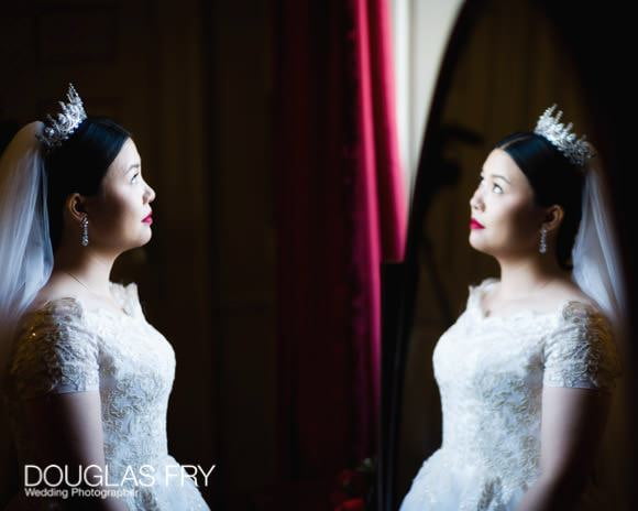 Bride photographed in mirror at Admirals House, Old Royal Naval College