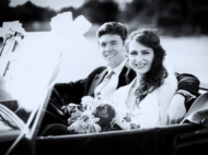 Couple photographed in vintage car leaving wedding church service