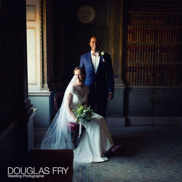 Couple photographed by window in Syon House