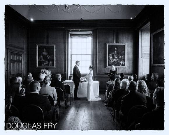 Wedding at the Admiral's House in Greenwich - bride and groom during ceremony