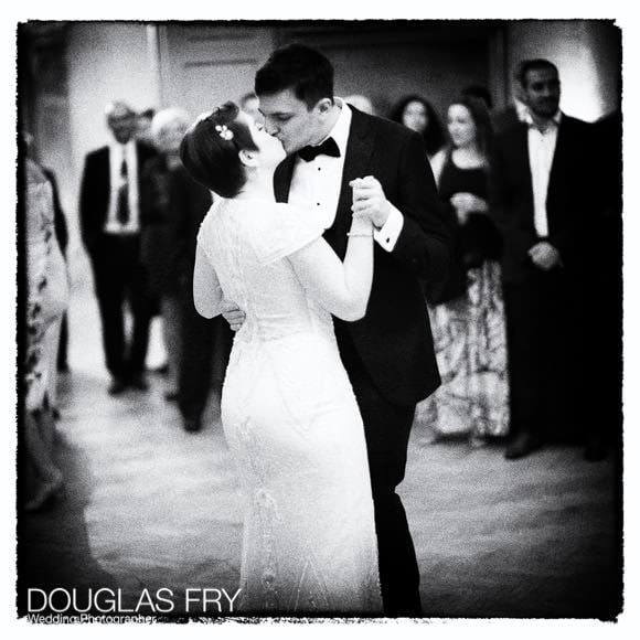 Black and white photograph taken on Leica of couple dancing at The Admiral's House in Greewich