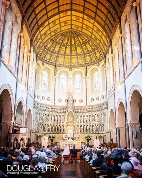 Inside of St Aloysius church Oxford during wedding ceremony