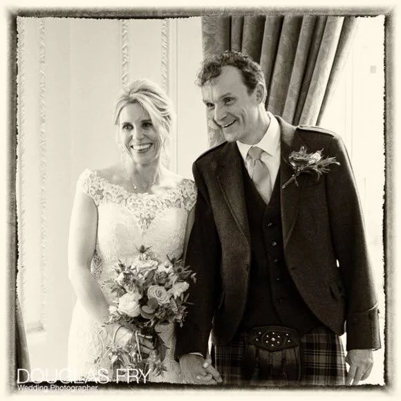 Wedding Photographer The Caledonian Club - Scottish Wedding Venue in London 3 Bride and Groom photographed in black and white at end of marriange ceremony