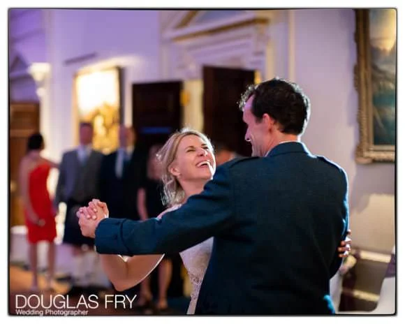 Wedding Photographer The Caledonian Club - Scottish Wedding Venue in London 7 Couple dancing at end of wedding day - photographed on Leica cameras