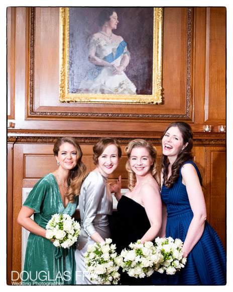 Bride with girl frends photographed at London Wedding